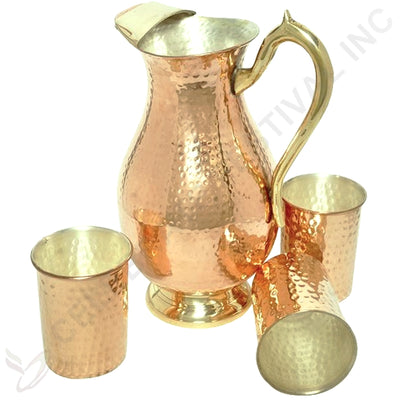 1.5L hammered copper water pitcher perfect for serving water, tea, or cocktails.