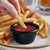 Acopa 2 oz. Black Smooth Melamine Ramekin - 12/Case