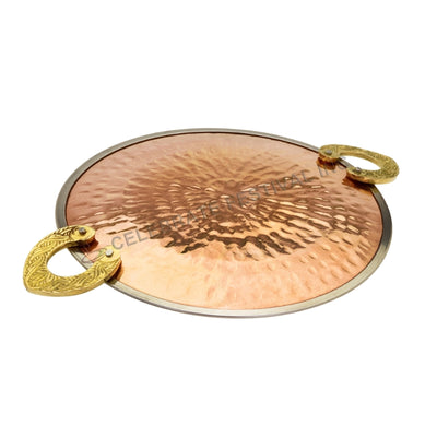 Elegant copper and steel round griddle with carved brass handles