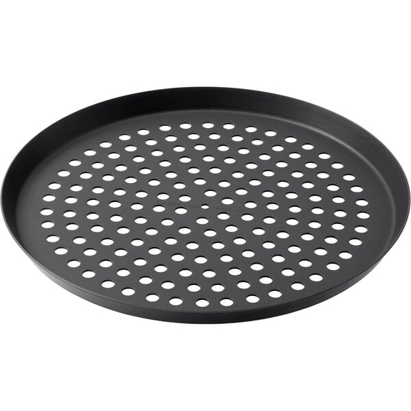 LloydPans nonstick perforated pizza pan used in commercial oven