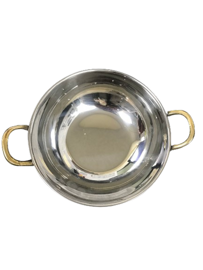 Elegant hammered stainless steel kadai for serving stir-fries and paella