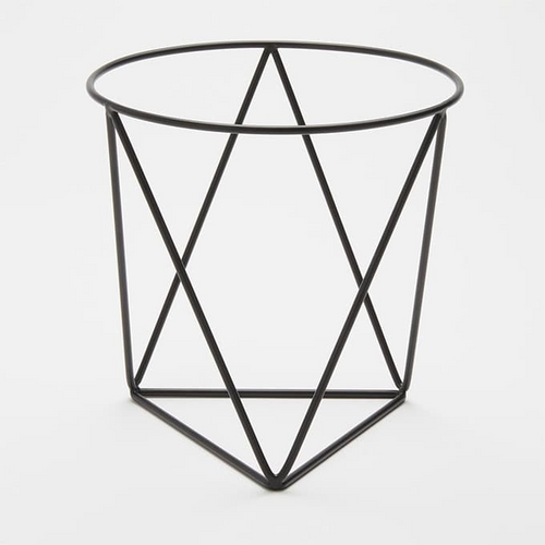Modern black geometric pizza stand by American MetalCraft on restaurant tabletop