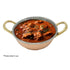Copper and stainless steel kadai used for serving Indian curry