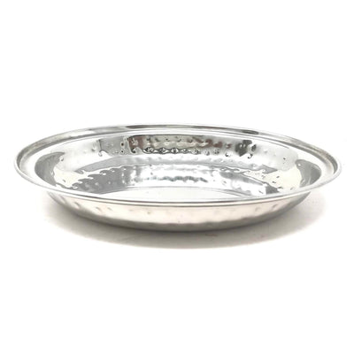 Durable oval serveware with hammered finish and raised edge