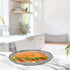 Handcrafted stainless steel platter with a sleek mirror finish for serving