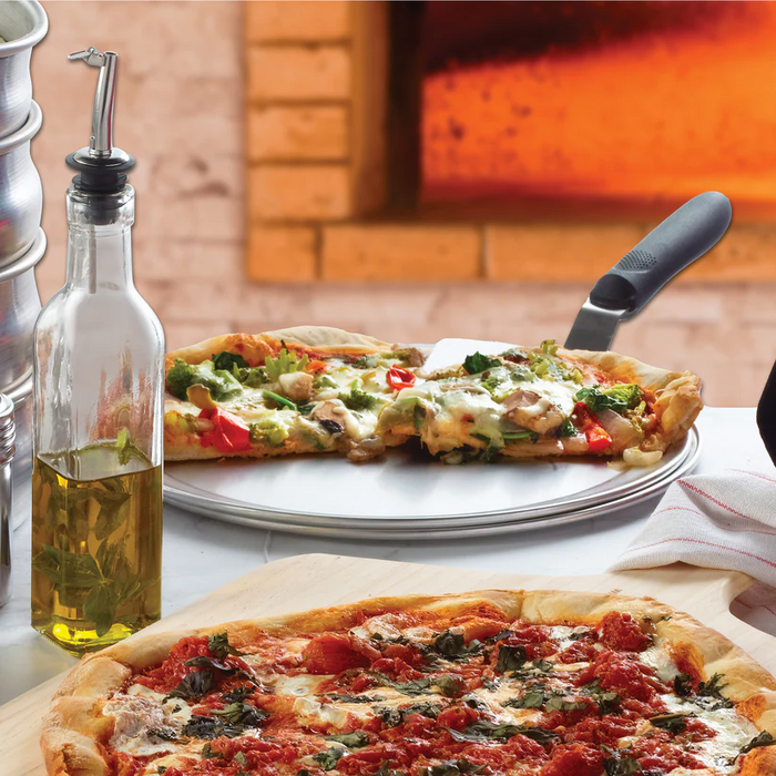 Winco baking tray used in pizzeria kitchen