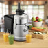Waring commercial juicer with 3-inch feed chute open and ready for produce