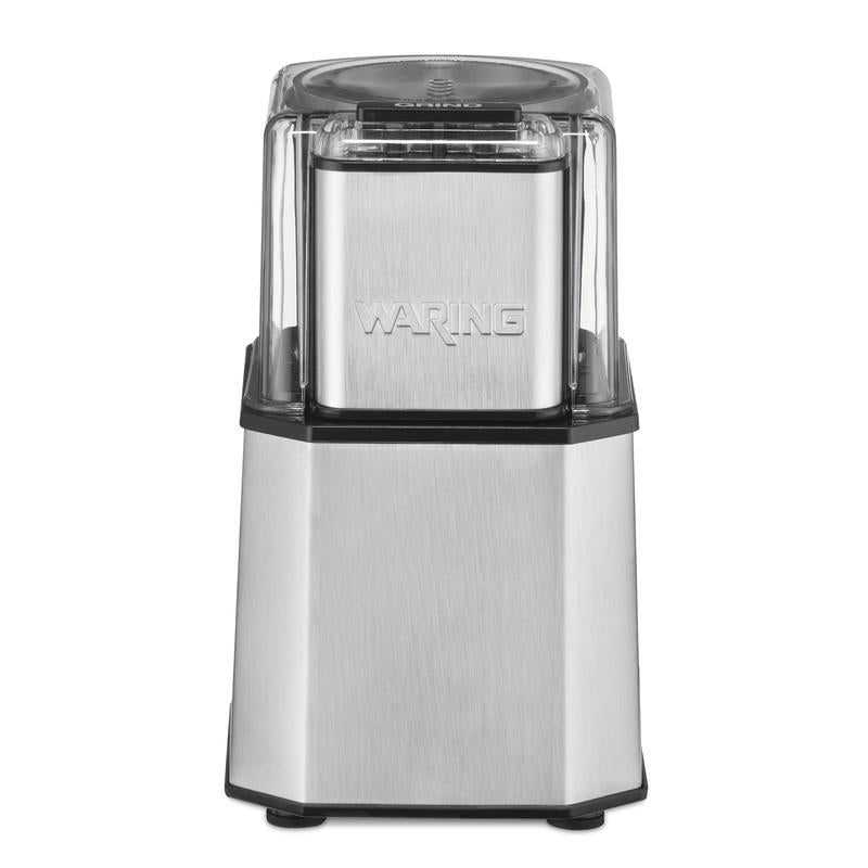 Waring WSG30 commercial electric spice grinder with stainless steel bowl on kitchen counter